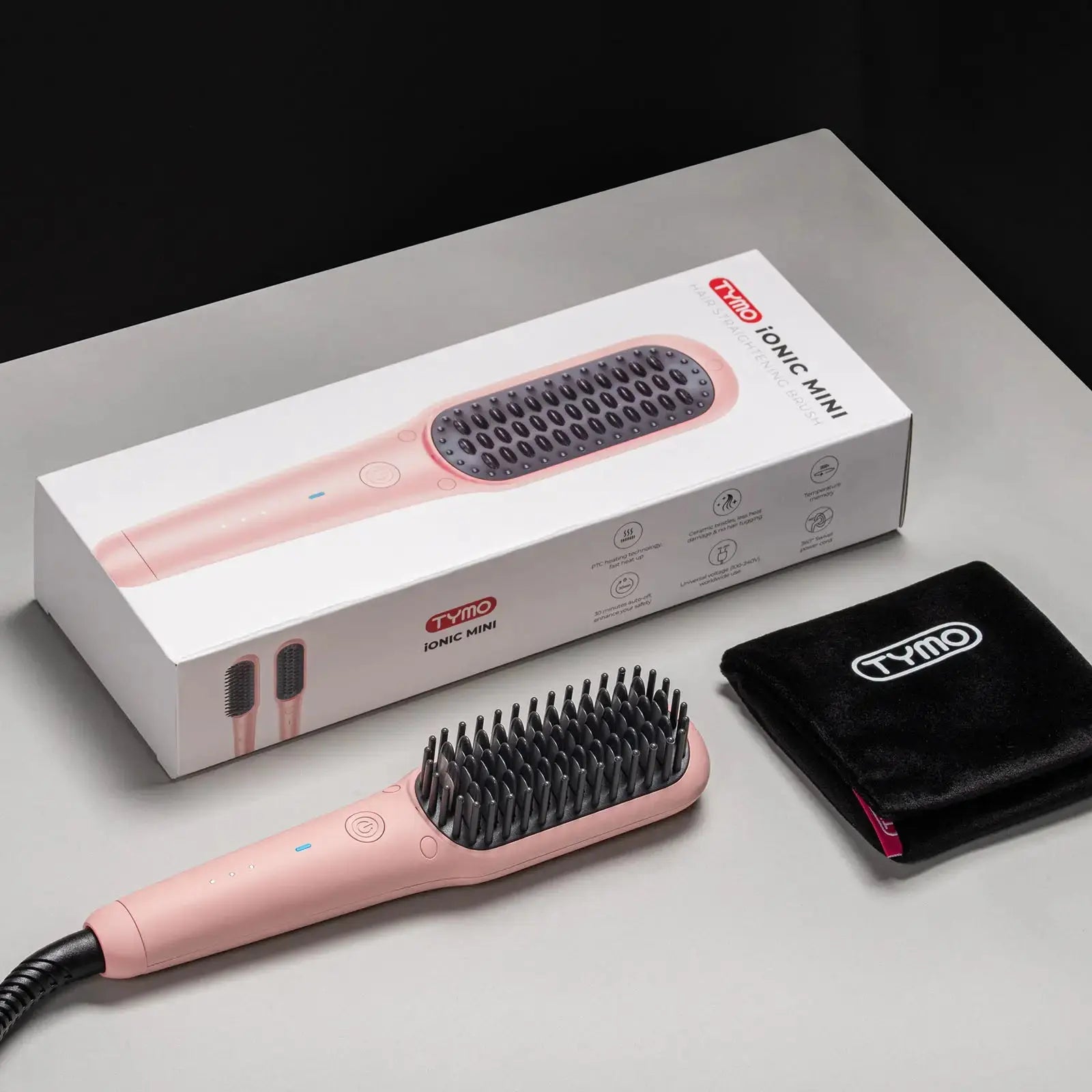TYMO iONIC MINI PINK product packaging and contents including the pink mini heat brush.